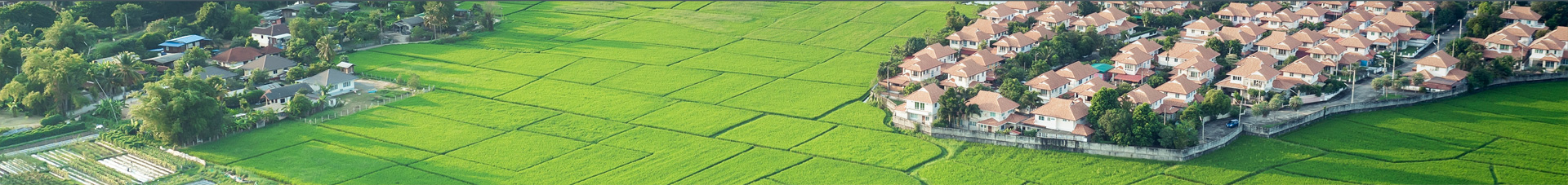 Ariel view of fields and housing